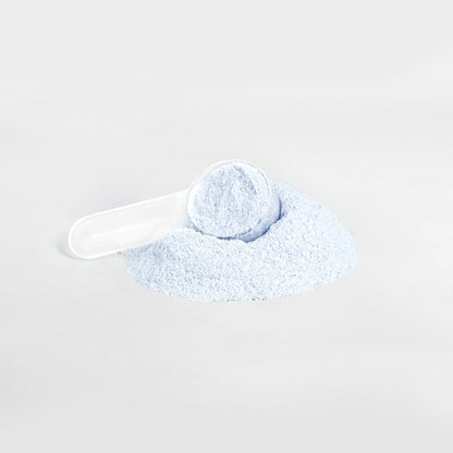 Cotton candy energy powder scoop on a white background.