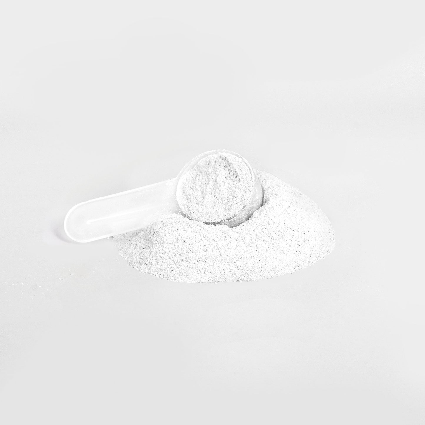 White energy powder with scoop for smooth boost and focus, sugar-free Lychee Splash flavor.