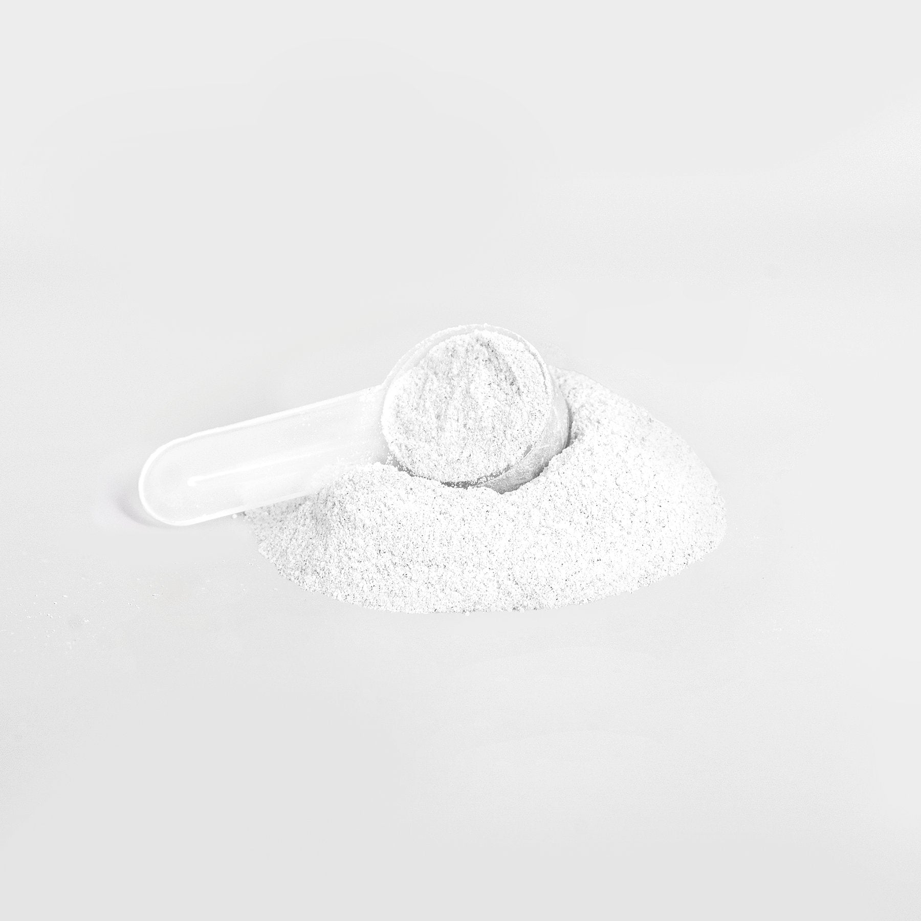 White energy powder with scoop for smooth boost and focus, sugar-free Lychee Splash flavor.